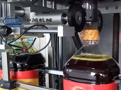 食用油瓶口套標(biāo)機(jī)